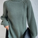Turtleneck sweater for women with raglan sleeves and split hem