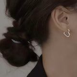 Gold Heart Hoop Earrings in Stainless Steel