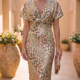 Midi dress with shaping effect, central knot, and fluid drape