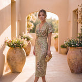 Midi dress with shaping effect, central knot, and fluid drape