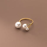 Elegant Ring with Trio of Pearls