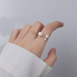 Elegant Ring with Trio of Pearls