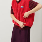 Buttoned sleeveless vest in lambswool for women – Soft, comfortable, and versatile