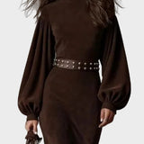 Long retro dress with long sleeves and a high collar