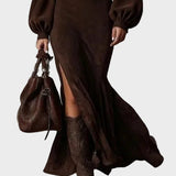 Long retro dress with long sleeves and a high collar