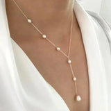 Elegant vintage necklace with pendant and pearls
